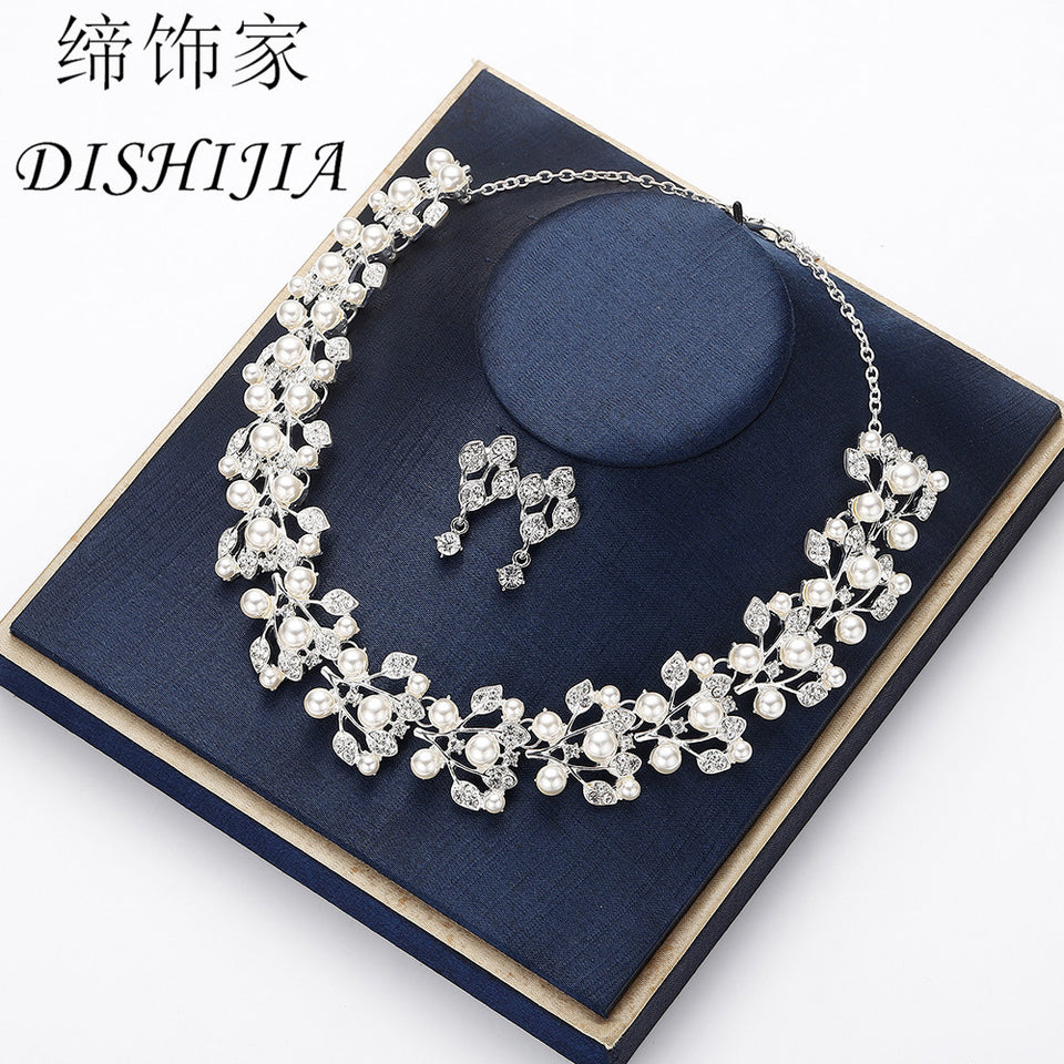 Cross-border creative new European and American bride pearl necklace earrings bracelet three-piece suit wedding jewelry wholesale